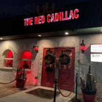 The Red Cadillac outside