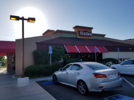 Sizzler Delivery Or Takeout Available outside