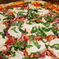 Tino’s Artisan Pizza Co. food