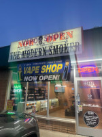 The Modern Smoker: Vape And Tobacco outside