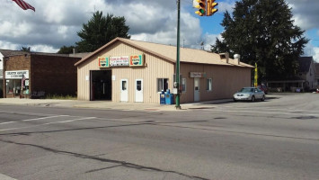 Curly's Pizza/drive-thru Doughnuts outside