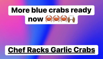 Chef Racks Garlic Crabs inside