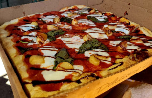 Flo Bros. Fire Smoked Pizza food