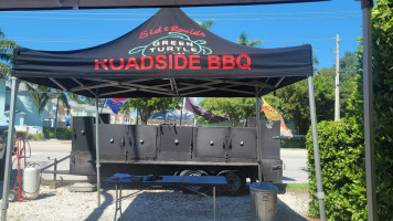 The Nest Bbq And Sports Operates A Roadside Bbq Located Adjacent To The Green Turtle Inn. outside