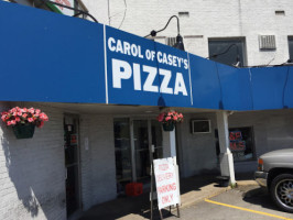 Carol Of Caseys Pizza Shop outside