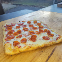 Flo Bros. Fire Smoked Pizza food