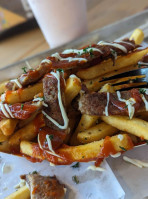 Eugene's Sausage Fries At Mustang Sally's Brewing food