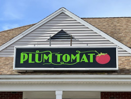 Plum Tomato Pizzeria In Bell outside