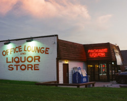 The Office Lounge Liquor Store In Bloom outside