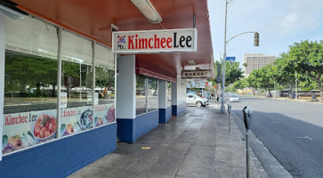 Mr Kim Chee Lee outside