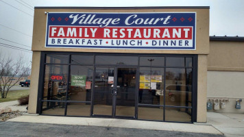 Village Court Family outside