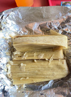 Delia's Specializing In Tamales food