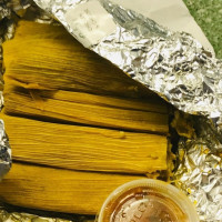 Delia's Specializing In Tamales food