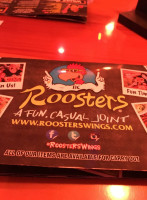 Roosters inside