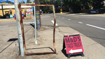 M&d Taco Truck outside