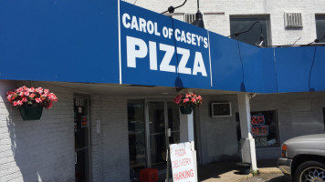 Carol Of Caseys Pizza Shop outside